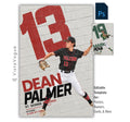 Baseball poster Photoshop template featuring an action player, oversized painted jersey number on a textured white brick wall, bold athlete name, team name, position, and class year.